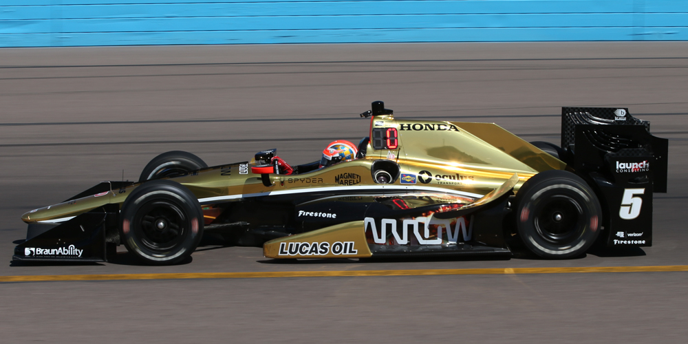 Canadian IndyCar driver James Hinchcliffe in his black and Honda Indy car