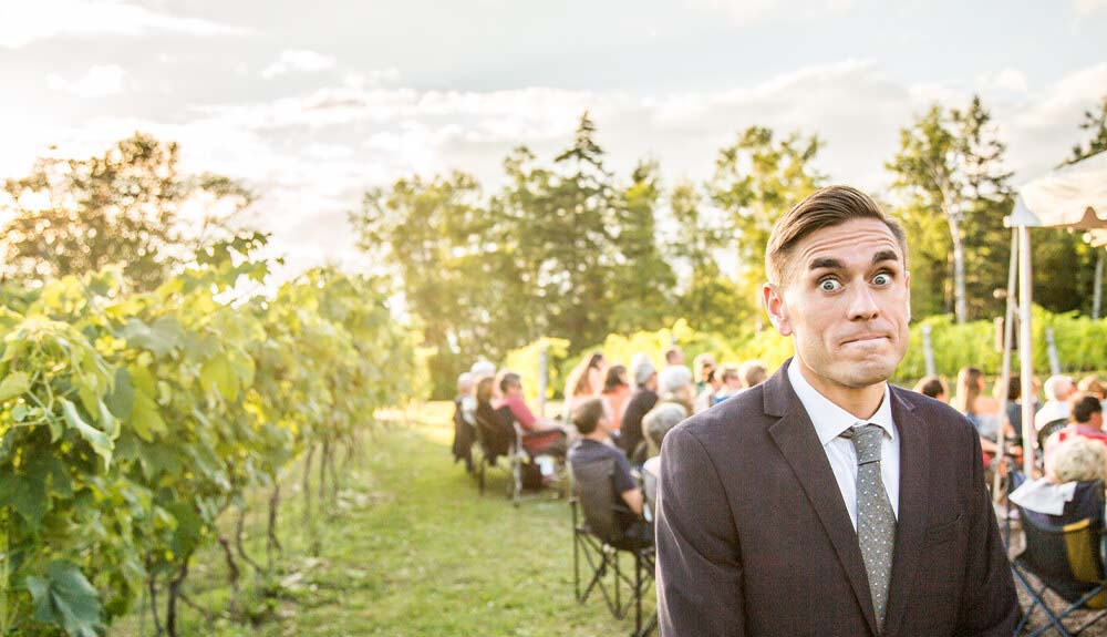 Comedian James Mullinger pulls a face at a wedding