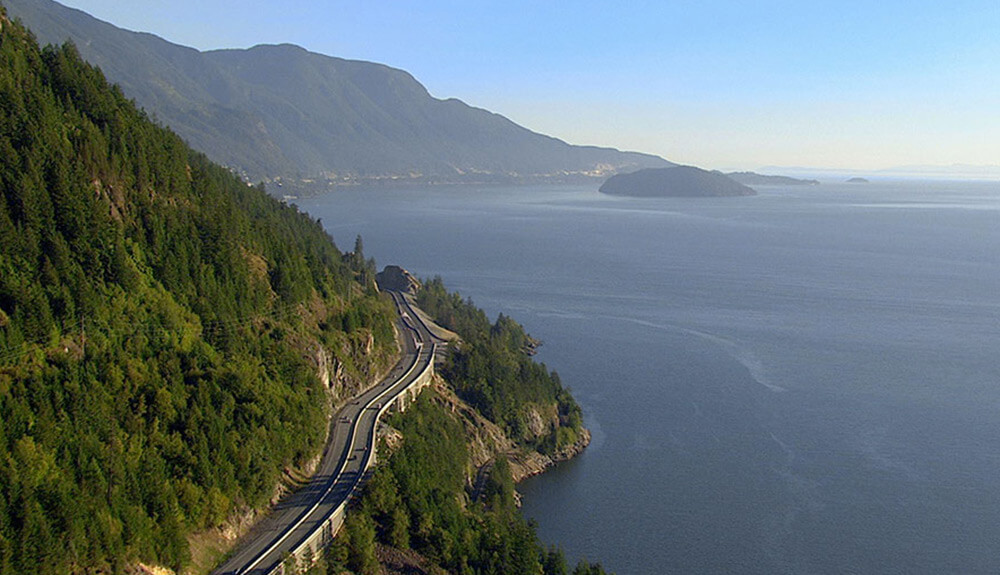 A coastal highway road is seen in beautiful British Columbia