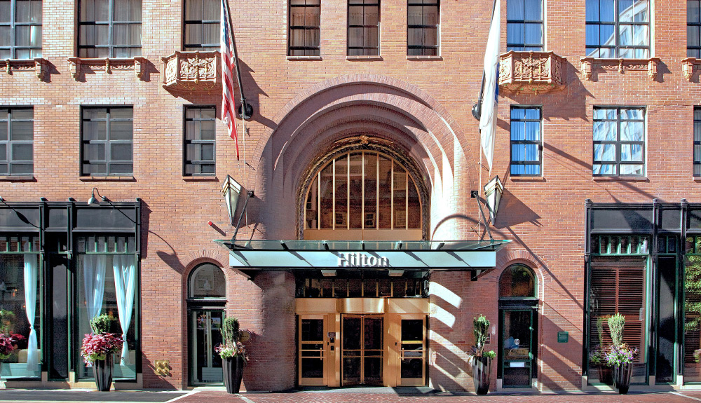 Entrance view of Hilton Boston Downtown/Faneuil Hall as part of a 1920s Art Deco skyscraper 