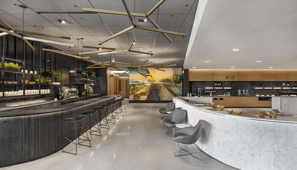 Bar seating and cafe area at the new Air Canada Cafe lounge at Toronto Pearson Airport