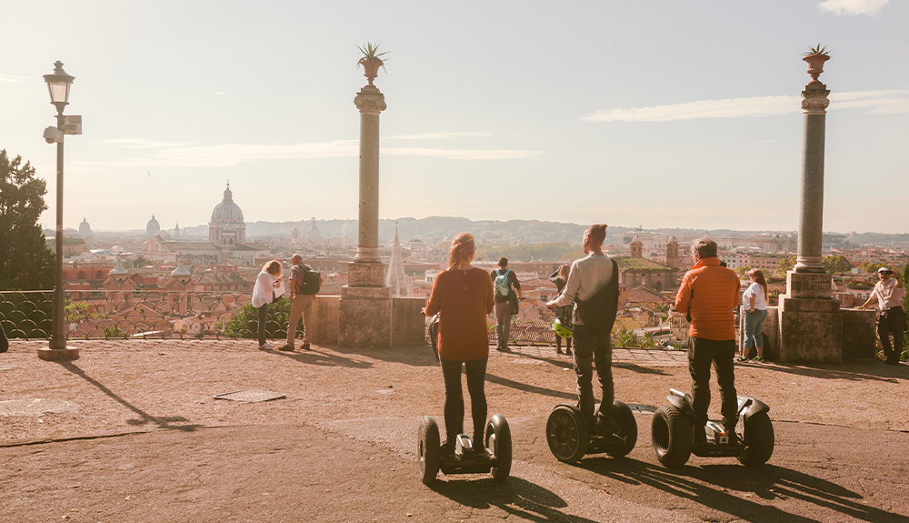 Three travellers explore Rome by Segway