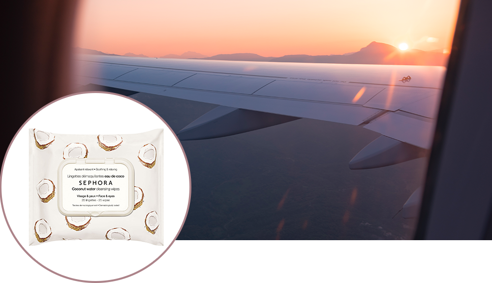 Product shot of Sephora makeup wipes over a shot of an airplane wing from out the window taken at sunset