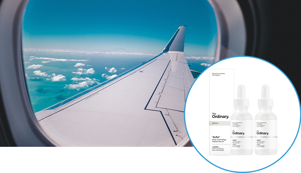 Product shot of The Ordinary Buffet serum over a photograph of the view of an airplane wing in the clouds from a window