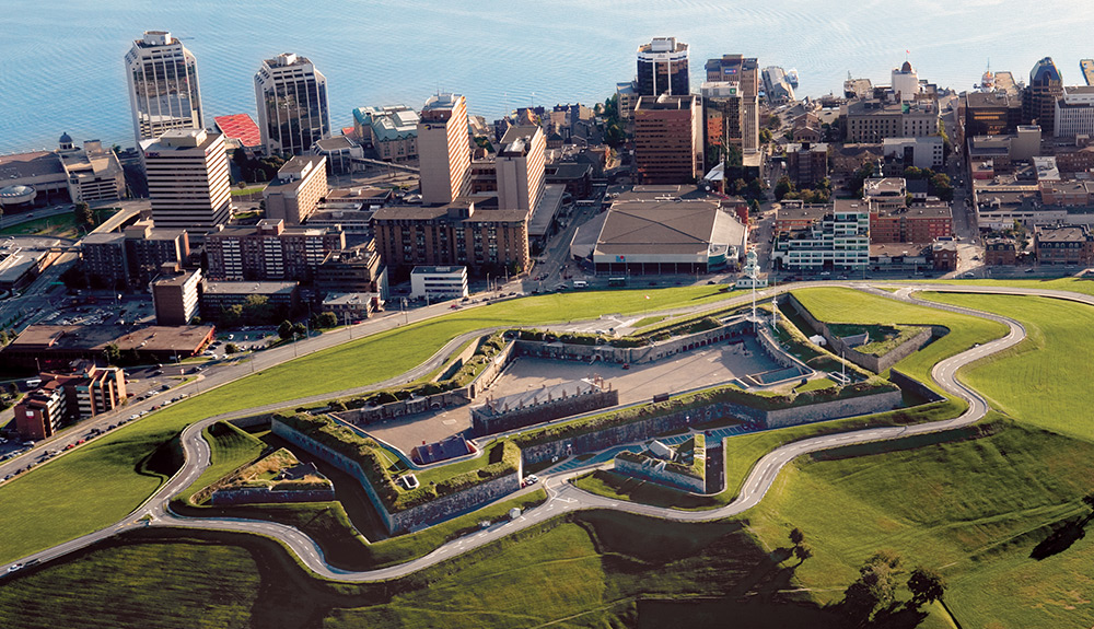 A large stadium in Halifax, Nova Scotia, the downtown core seen behind it