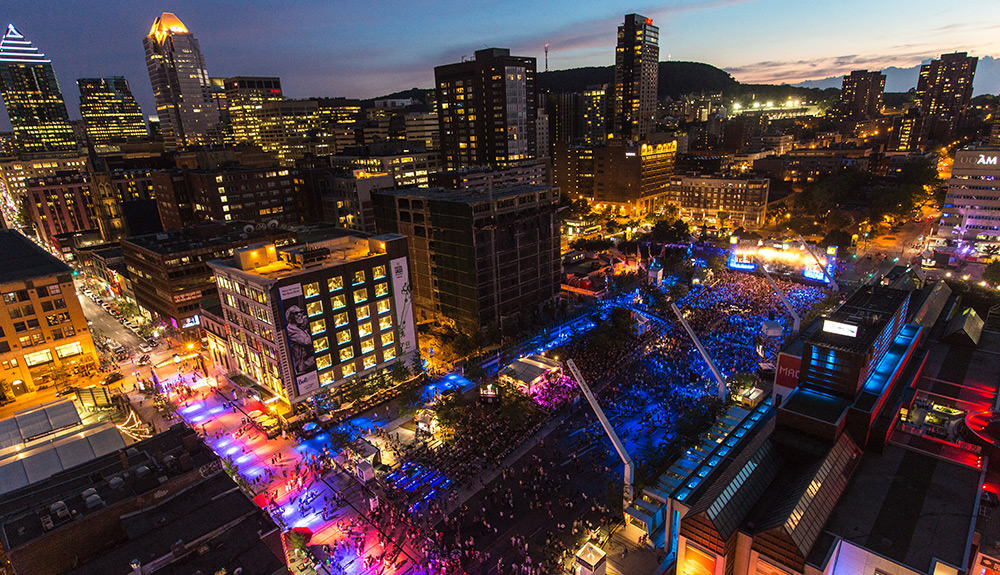 Montreal, Quebec seen from overhead, lit up with blue and red lights