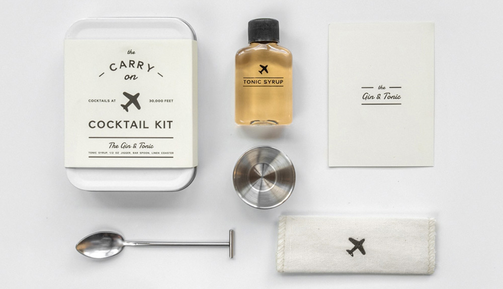 W&P Carry on Cocktail Kit laid out with recipe card, syrup, mixing spoon and metal cup