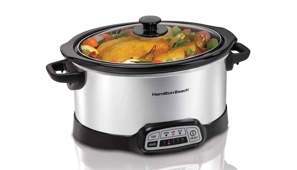 Turkey cooking inside of a slow cooker
