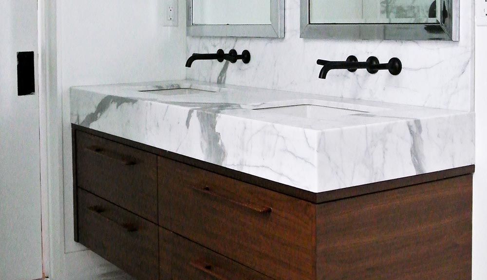 Double bathroom sink with two drawers of storage beneath