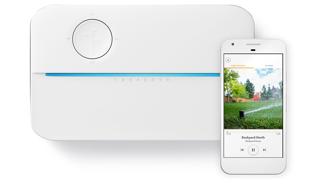 Smart sprinkler and a phone that you can set controls up on are shown