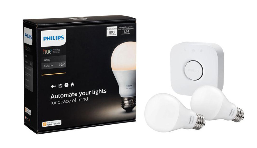 Product shot of the Philips Hue White A19 starter kit including two light bulbs and hub
