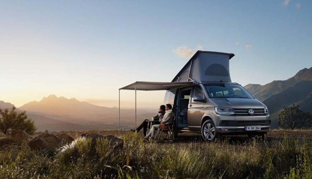 A grey Volkswagen California Ocean camper van is shown
