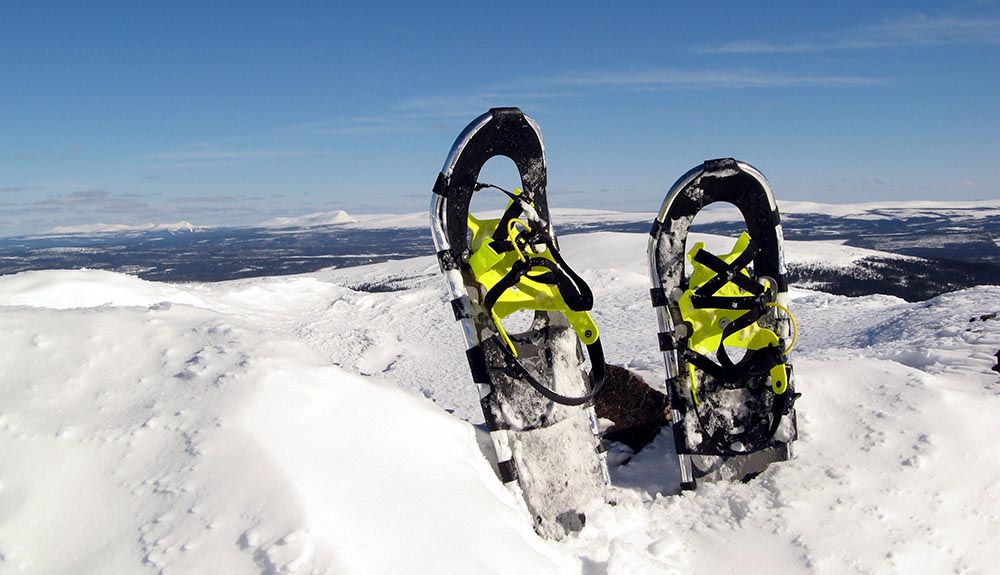 Snowshoes are seen stuck in a large pile of snow in Iceland