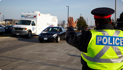 Police office directing traffic