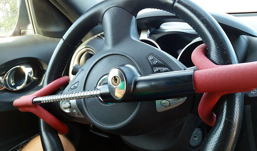 https://www.caasco.com/-/media/caasco/blog/automotive/2022/07/articles/how-to-protect-your-vehicle-and-outsmart-car-thieves-and-carjackers/blog-img--anti-theft-car-steering-wheel-with-a-lock.jpg