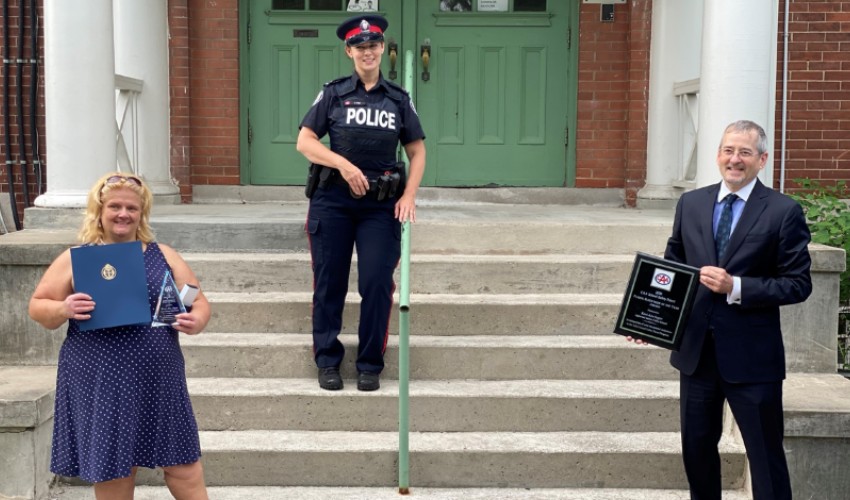 Kerri-Ann Sagert, teacher at Agincourt Junior Public School and CAA School Safety Patrol Supervisor of the Year Award Winner 2020. Toronto Police Constable Jenelle Higo, Traffic Services. Robert McKone, Principal at Agincourt Junior Public School in Toronto.