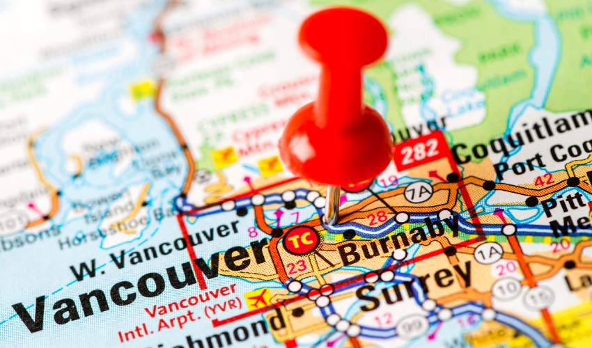 Map of Vancouver with a pushpin marking the city.