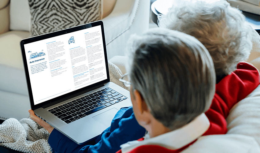 Mature couple looking at laptop