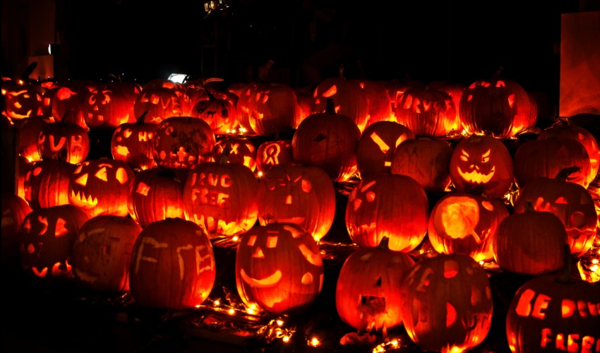 Pumpkins lit up at night