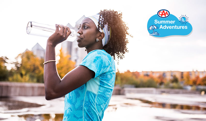 Woman holding water bottle