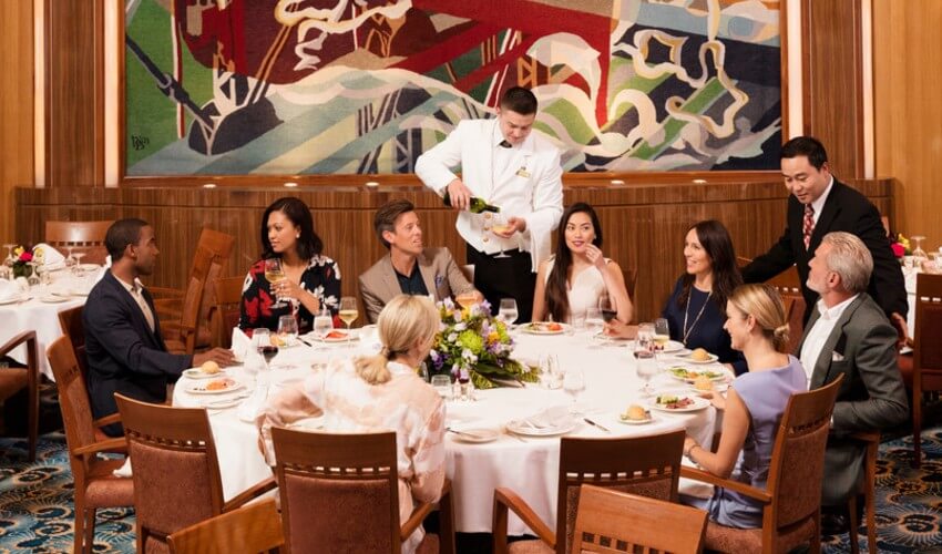 Group of travelers dining onboard the Cunard Ship.