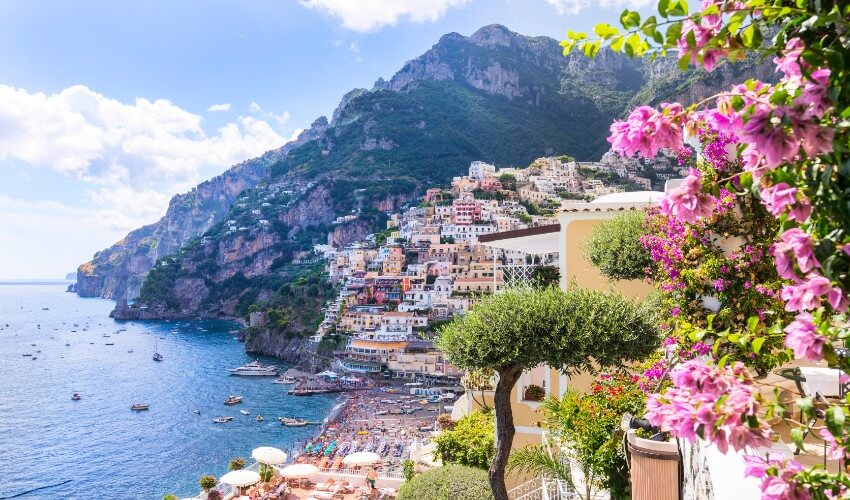 Aerial view of Positano cliffs along Amalfi coast.