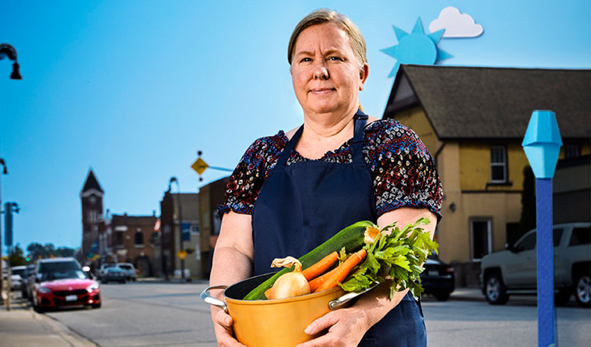 Woman with pot and vegetables