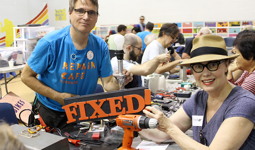 Volunteers fixing items