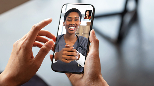 Person on a video call with a general practitioner