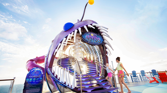 Mother and daughter entering the Ultimate Abyss slide