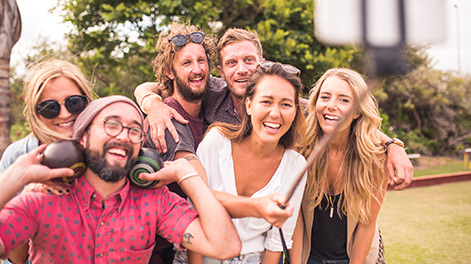 Employees posing for picture after lawn bowling