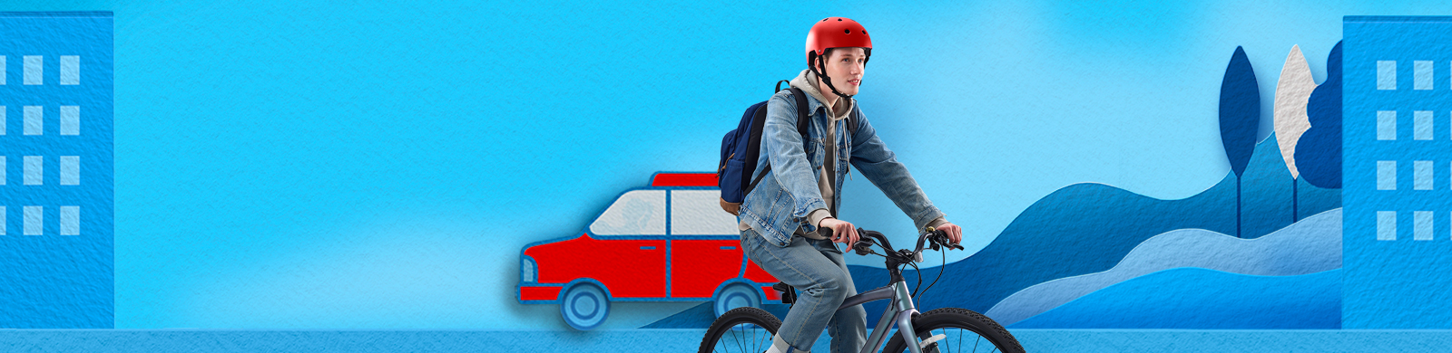 A person riding on a bicycle wearing a red helmet