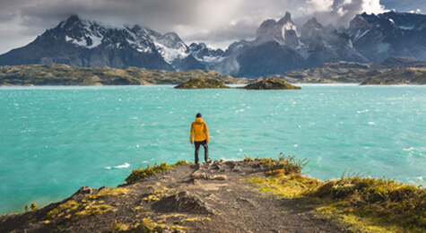 A tourist admiring the Cordillera Paine