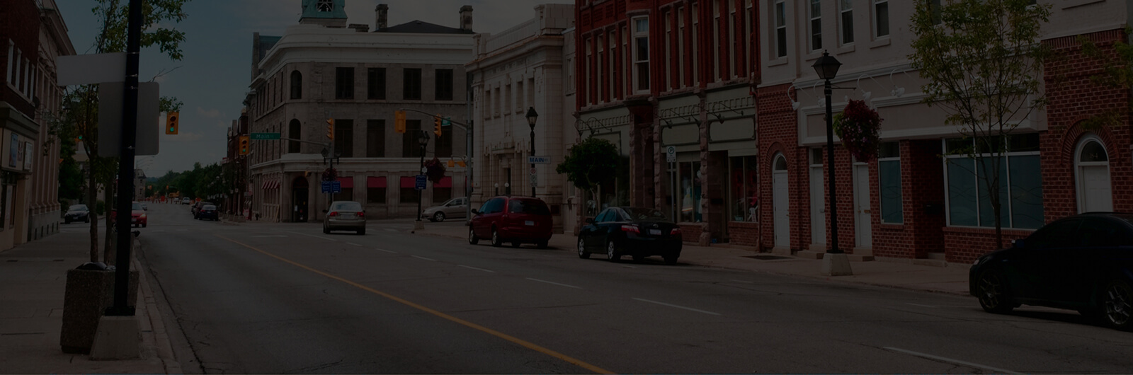 Main street of small town, with historical architecture and store-front buildings.