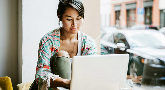 Young woman working on laptop