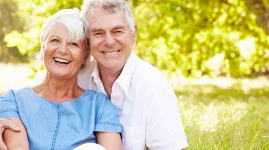 Senior couple sitting at the park