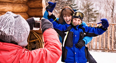 Mother and son in a winter cabin