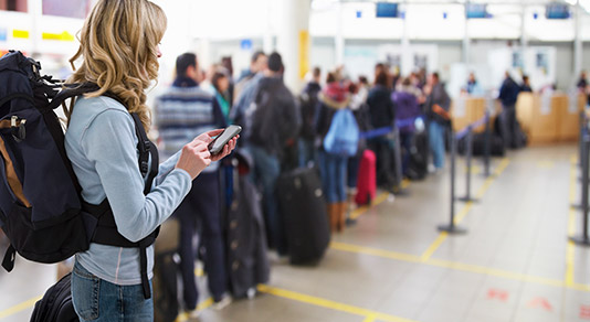 Woman waiting in line at the airport