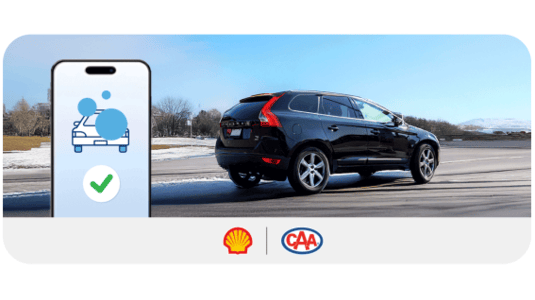 CAA and Shell logo with black car on the road.
