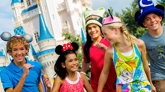 Kids walking in front of Cinderella Castle