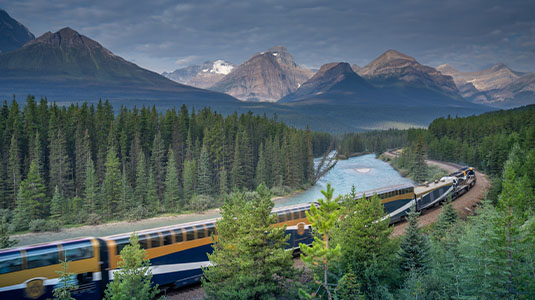 Passenger train passing through Banff National Park