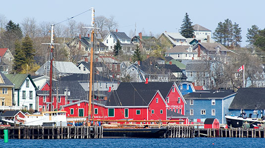 Tall ships and colourful buildings in Lunenburg.