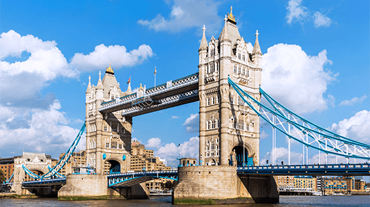 Tower Bridge stretching over the River Thames.