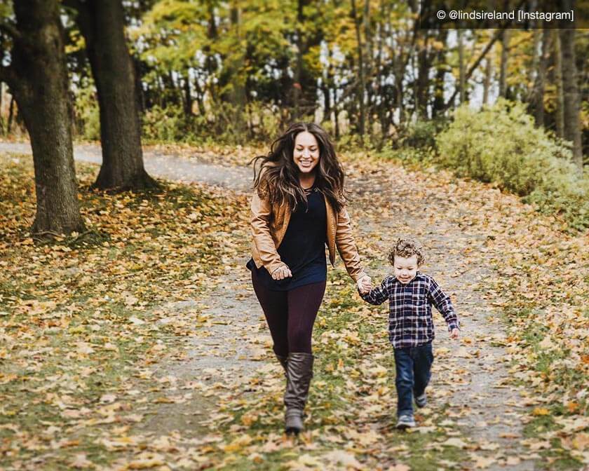 Mom and son walking on a trail