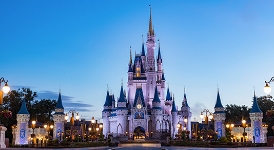 An evening view of Disney's Magic Kingdom. 