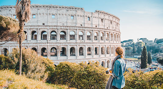 Woman Standing By Coliseum, Rome