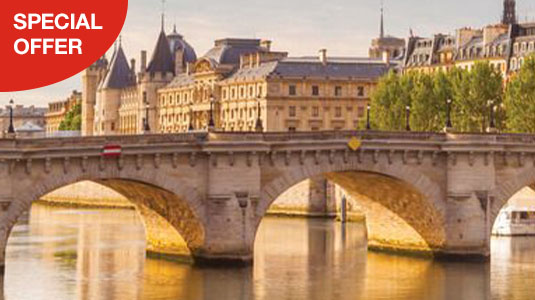 View of an old stone bridge with old building in the background. Special offer.