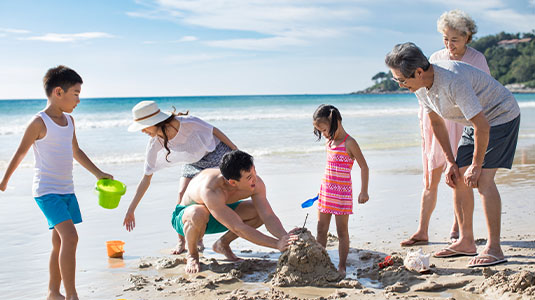 A family playing at the beach