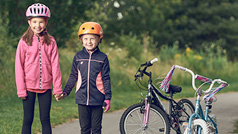 Kids beside their bikes